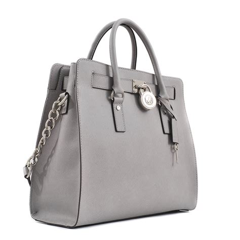 michael michael kors taschen grau|Michael Kors opened satchel purse.